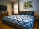 The main bedroom features hardwood floors, two windows, and overhead lighting at 1263 Briarcliff Ne Rd, Atlanta, GA 30306
