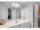 Bathroom sink with white cabinetry, large mirror, and lots of natural light at 1286 Creekside Se Ter, Smyrna, GA 30082