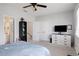 Bedroom featuring neutral walls, carpet, ceiling fan and double closets at 1286 Creekside Se Ter, Smyrna, GA 30082