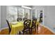 Stylish dining room with hardwood floors, contemporary lighting, and views to the exterior at 1286 Creekside Se Ter, Smyrna, GA 30082