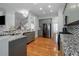 Well-equipped kitchen with stainless steel appliances, granite countertops, and ample cabinet space; ideal for culinary enthusiasts at 1286 Creekside Se Ter, Smyrna, GA 30082