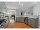 Bright kitchen featuring granite countertops, a gas range, and modern fixtures; a chef's dream with stainless steel appliances at 1286 Creekside Se Ter, Smyrna, GA 30082