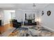 Comfortable living room featuring modern decor, neutral walls, and an open floor plan at 1286 Creekside Se Ter, Smyrna, GA 30082