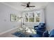 Bedroom seating area with plush chairs and bright natural light from large windows at 1286 Creekside Se Ter, Smyrna, GA 30082