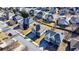 Aerial view of a home within a residential neighborhood, highlighting its positioning among other houses and street access at 1465 Forest Brook Trl, Cumming, GA 30041