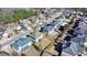 Aerial view of a home with a large, fenced backyard, showcasing the property's layout within the neighborhood at 1465 Forest Brook Trl, Cumming, GA 30041