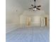 Enormous bedroom featuring a vaulted ceiling, light-colored walls, and soft carpeting at 1465 Forest Brook Trl, Cumming, GA 30041
