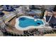 Community pool with cabana, lounge seating, and covered picnic pavilion surrounded by landscaping at 1465 Forest Brook Trl, Cumming, GA 30041