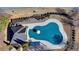 An aerial perspective of the neighborhood pool featuring lounge area, covered seating, and mature landscaping at 1465 Forest Brook Trl, Cumming, GA 30041