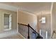 Open foyer with high ceilings, iron railing, and an elegant chandelier at 1465 Forest Brook Trl, Cumming, GA 30041