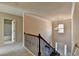 Open foyer with a decorative chandelier and staircase at 1465 Forest Brook Trl, Cumming, GA 30041