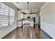 Modern eat-in kitchen with stainless steel appliances, white cabinetry, and granite countertops at 1465 Forest Brook Trl, Cumming, GA 30041