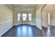 Elegant living room featuring hardwood floors and lots of natural light at 1465 Forest Brook Trl, Cumming, GA 30041