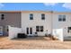 Backyard with a small patio area and privacy fence at 1026 King Iron Dr, Lawrenceville, GA 30045