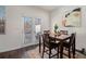 Cozy dining area with outdoor access and natural light, perfect for Gathering meals at 1026 King Iron Dr, Lawrenceville, GA 30045