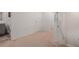 Upstairs hallway with carpet flooring and access to bedrooms and bathrooms at 1026 King Iron Dr, Lawrenceville, GA 30045