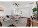 Bright living room with dark wood flooring and a large sectional couch at 2599 Church Nw St, Atlanta, GA 30318