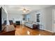 Beautiful living room featuring a fireplace, hardwood floors, and light gray walls at 42 Winchester Dr, Euharlee, GA 30145