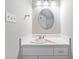 Bathroom featuring a white vanity, framed mirror, and bright lighting at 2762 Whitehurst Ne Dr, Marietta, GA 30062