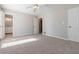 Bedroom with neutral carpet and a ceiling fan offering both comfort and functionality at 2762 Whitehurst Ne Dr, Marietta, GA 30062