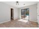 Bedroom featuring tile floors, a ceiling fan, access to a deck, and pool views at 2762 Whitehurst Ne Dr, Marietta, GA 30062