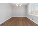 Clean dining room with natural wood floors and ample natural light at 2762 Whitehurst Ne Dr, Marietta, GA 30062