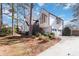 Well-maintained home with white exterior, featuring a two-car garage and inviting front entrance at 2762 Whitehurst Ne Dr, Marietta, GA 30062