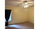 Bedroom featuring natural light, carpet floors and a ceiling fan at 3220 Indian Shoals Rd, Dacula, GA 30019