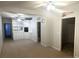 Cozy living room with built-in shelving and a view to an adjacent bathroom adds functionality and comfort at 3220 Indian Shoals Rd, Dacula, GA 30019