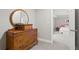 Bedroom with carpet and vintage wooden dresser at 3460 Trow Creek Ln, Cumming, GA 30040