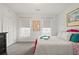 Bright bedroom with natural light featuring neutral colors and carpet at 3460 Trow Creek Ln, Cumming, GA 30040