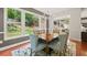 Bright dining room with a large window and view of the backyard at 3460 Trow Creek Ln, Cumming, GA 30040