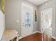Elegant foyer with hardwood floors and decorative glass front door at 3460 Trow Creek Ln, Cumming, GA 30040