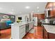 Open kitchen with granite countertops, stainless steel appliances, and an open floorplan design at 3460 Trow Creek Ln, Cumming, GA 30040