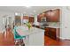 Modern kitchen with granite counters, stainless appliances, and eat-in breakfast bar at 3460 Trow Creek Ln, Cumming, GA 30040