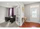 Bright office space with French doors and a stylish console table near the entrance at 3460 Trow Creek Ln, Cumming, GA 30040