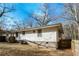View of backyard and the exterior of the home at 114 Howell Sw Dr, Atlanta, GA 30331