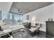 This modern bedroom features floor-to-ceiling windows with views of the city skyline at 860 Peachtree Ne St # 1502, Atlanta, GA 30308