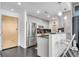 Modern kitchen features stainless steel appliances, bar seating, and sleek countertops at 860 Peachtree Ne St # 1502, Atlanta, GA 30308