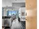 Cozy living space with a modern kitchen, city views, and contemporary furnishings at 860 Peachtree Ne St # 1502, Atlanta, GA 30308