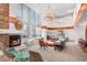 A lounge features cozy seating, a fireplace, and modern decor at 860 Peachtree Ne St # 1502, Atlanta, GA 30308