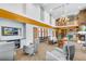 Grand community lounge with fireplace, plush seating, and modern design at 860 Peachtree Ne St # 1502, Atlanta, GA 30308