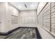 Well-maintained mailroom featuring multiple mailboxes and clean floors at 860 Peachtree Ne St # 1502, Atlanta, GA 30308