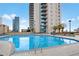 Luxurious rooftop pool with city skyline views and space for relaxation at 860 Peachtree Ne St # 1502, Atlanta, GA 30308