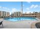 Beautiful rooftop pool with comfortable lounge chairs and city views at 860 Peachtree Ne St # 1502, Atlanta, GA 30308
