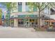 Attractive storefront with outdoor seating, showcasing a lively commercial area at 860 Peachtree Ne St # 1502, Atlanta, GA 30308