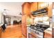 Well-equipped kitchen featuring stainless steel appliances and seamless view to the living room at 6069 Shallow Wood Ln, Douglasville, GA 30135