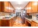 Functional kitchen with ample cabinet space and a view into the bright and open living area at 6069 Shallow Wood Ln, Douglasville, GA 30135
