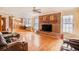 Bright living area features hardwood floors, brick fireplace, and a seamless flow to the kitchen at 6069 Shallow Wood Ln, Douglasville, GA 30135