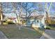 Attractive home showcasing a well-manicured lawn, light blue siding, and a charming front porch, enhancing its curb appeal at 127 Marona Ne St, Atlanta, GA 30307